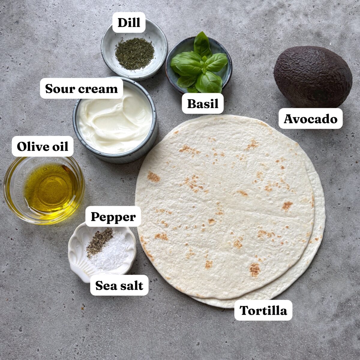 Dill, basil, an avocado, sour cream, olive oil, pepper, sea salt, and two tortillas.