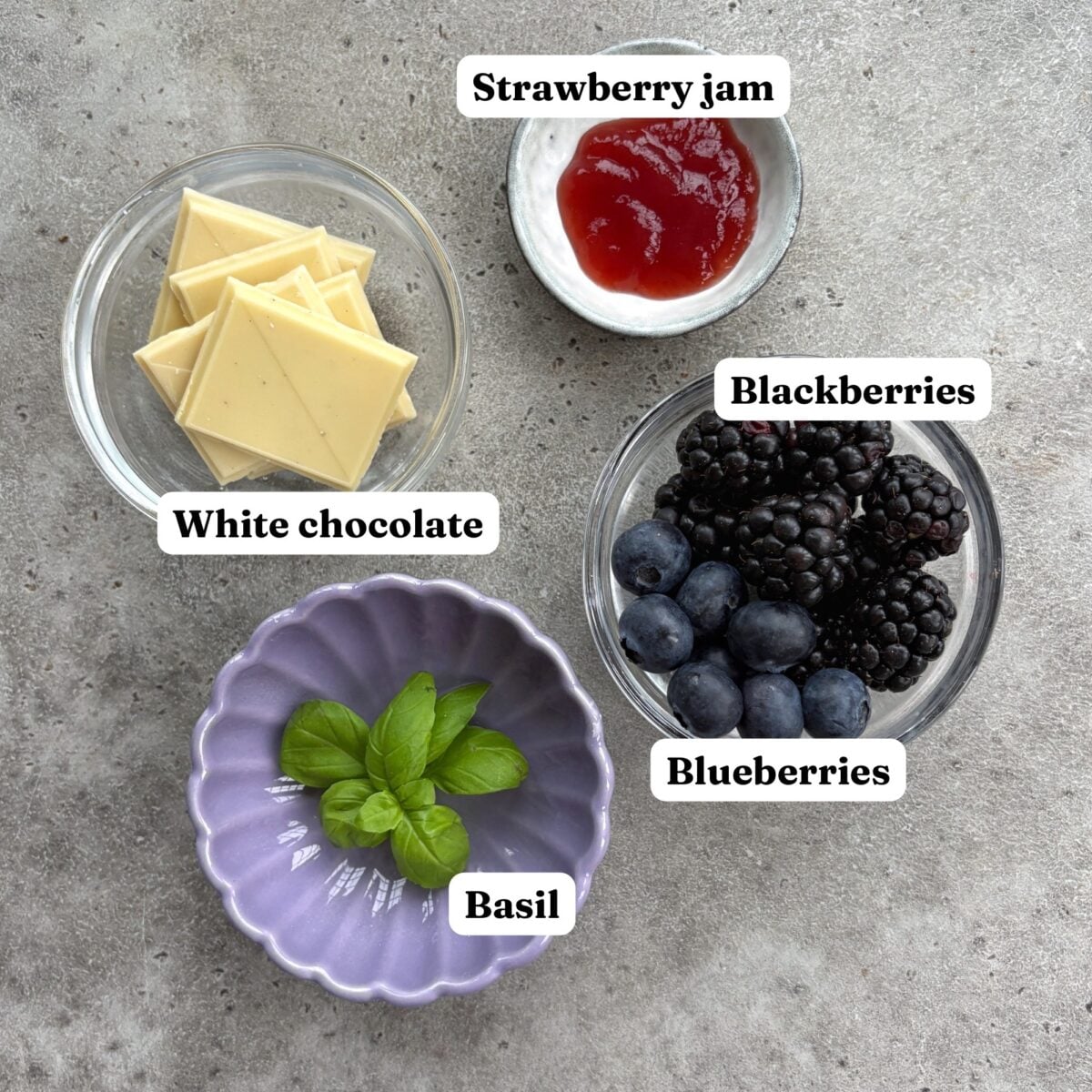 White chocolate, strawberry jam, mixed berries, and fresh basil.