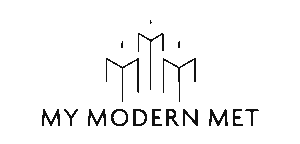 A minimalist black and white logo featuring three stylized skyscrapers above the text MY MODERN MET.