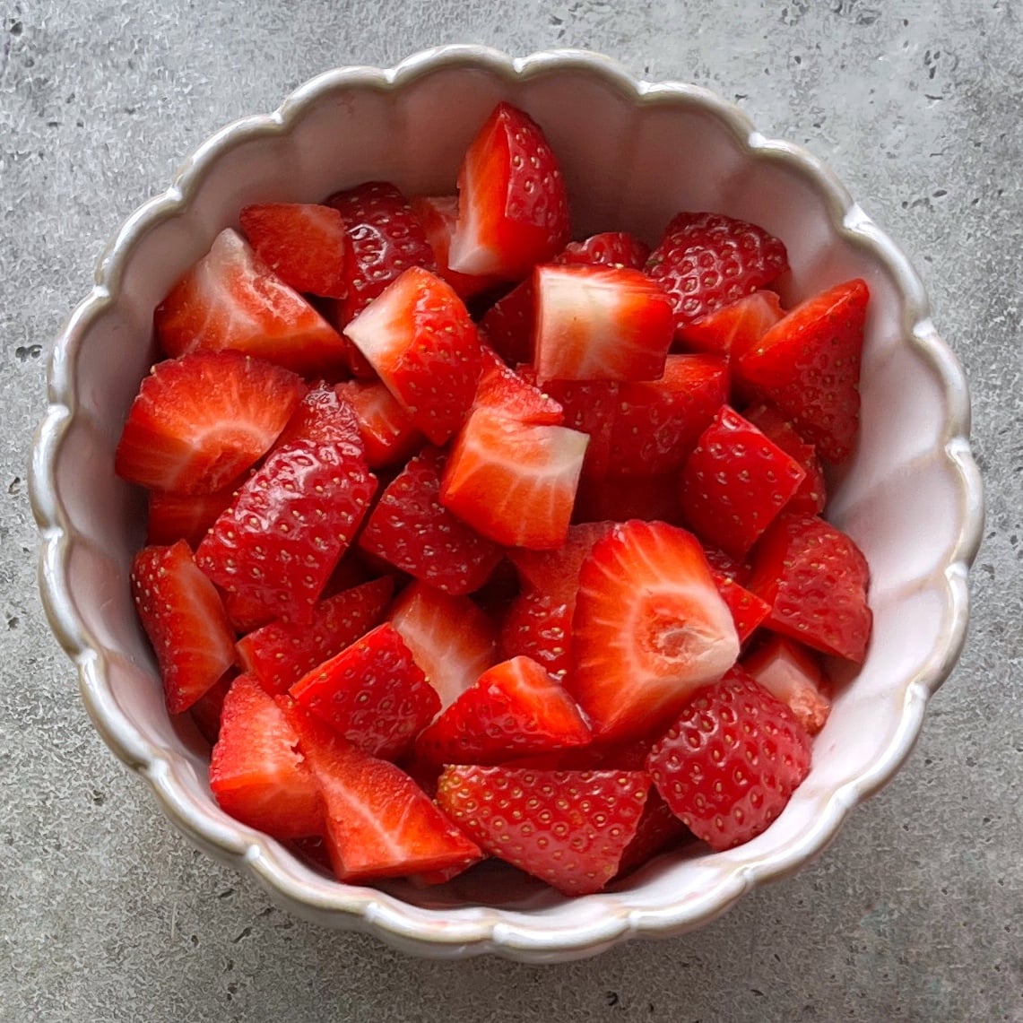 A bowl of fresh strawberries.